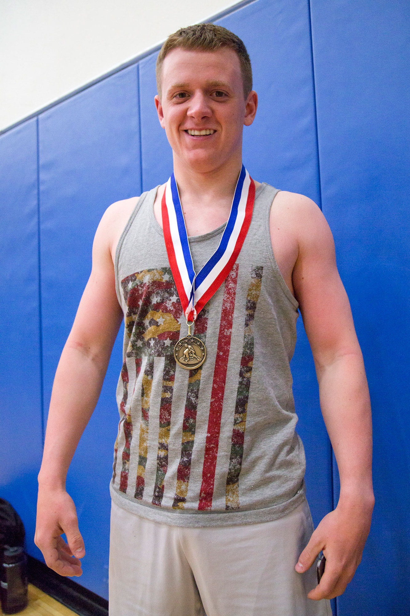 Service members compete in an intramural wrestling tournament on Joint Base Elmendorf-Richardson, Alaska, April 9, 2015. (U.S.Air Force photo/Alejandro Pena)