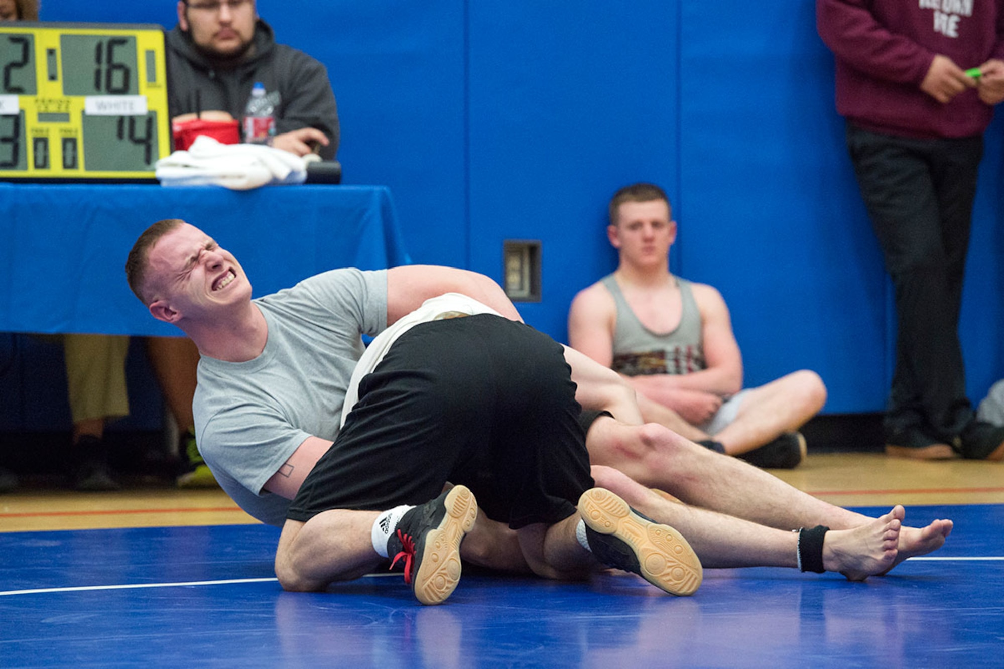 Service members compete in an intramural wrestling tournament on Joint Base Elmendorf-Richardson, Alaska, April 9, 2015. (U.S.Air Force photo/Alejandro Pena)