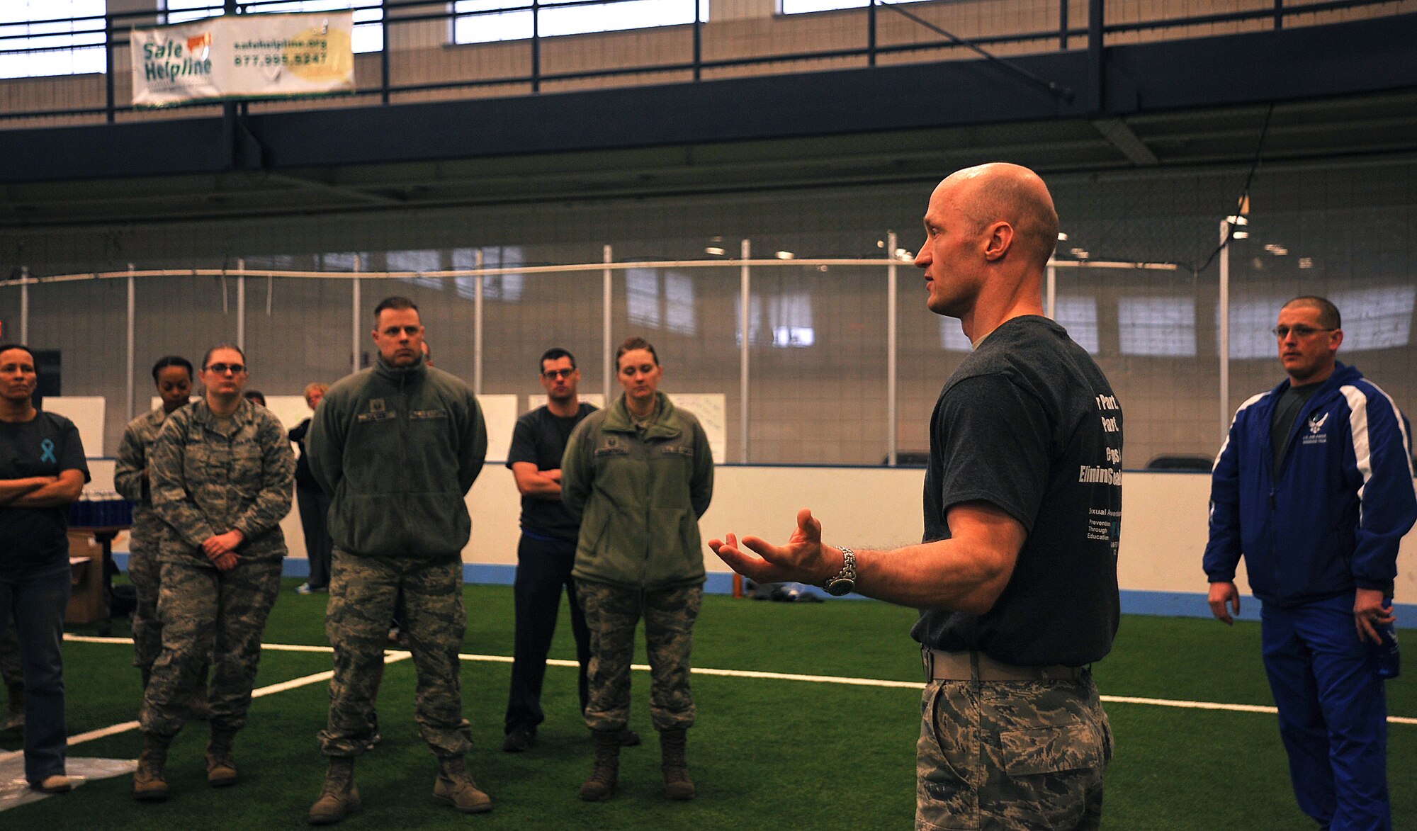 Col. Robert Cook, 319th Air Base Wing vice commander, provides opening remarks at the Sexual Assault Awareness and Prevention month Day of Action on Grand Forks Air Force Base, N.D., April 7, 2015. April is recognized by military and civilian communities within the Department of Defense as Sexual Assault Awareness and Prevention month. This year’s SAAPM theme was “Eliminate sexual assault. Know your part. Do your part.” (U.S. Air Force photo/Airman 1st Class Bonnie Grantham/released)