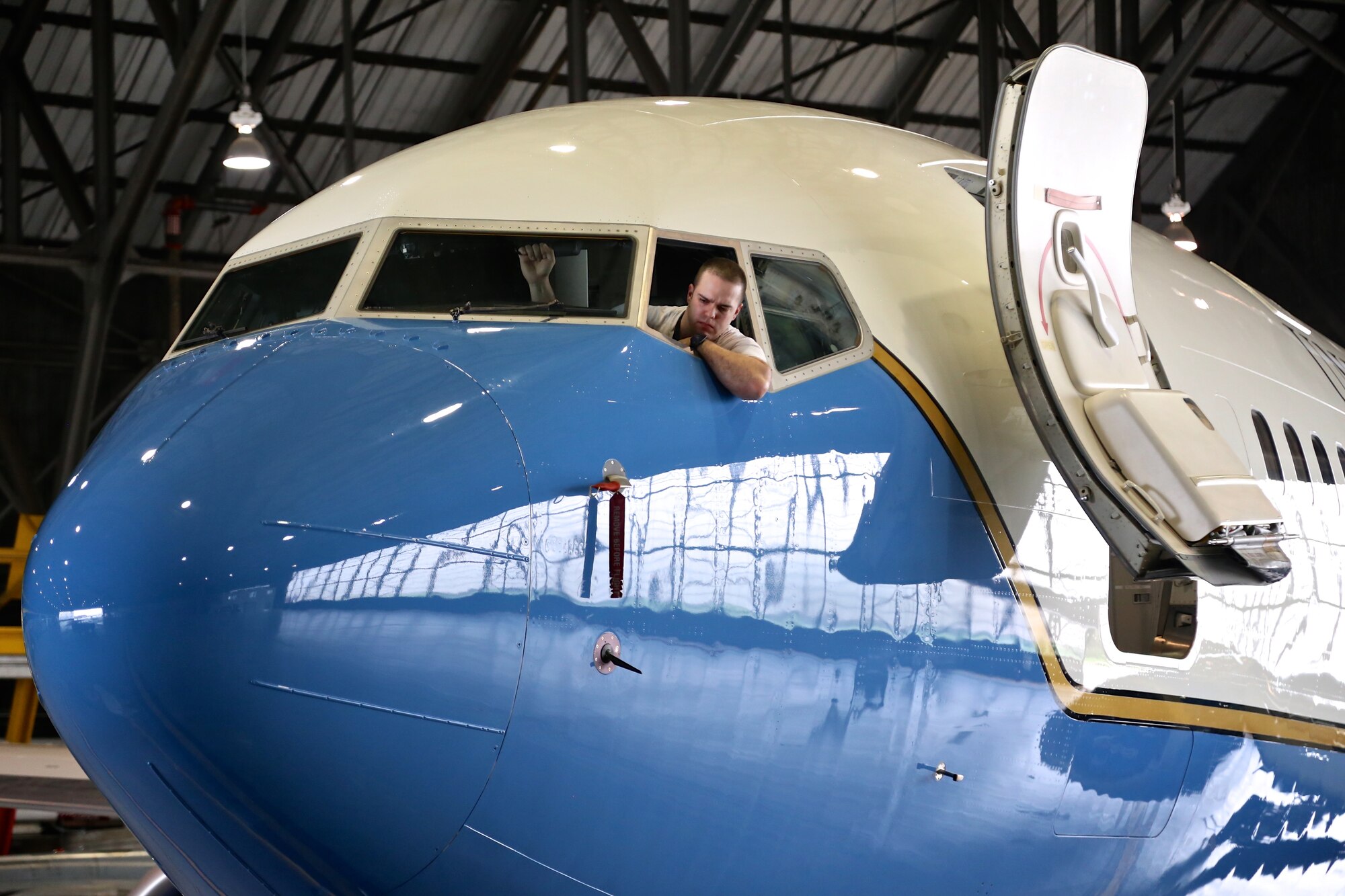 Staff Sgt. Kenny Vandehey, crew chief with the 932nd Airlift Wing, rides the brakes of a C-40 that is being prepped for an "A-Check", routine maintenance service inspection, April 8, 2015 in Hangar 1, Scott Air Force Base Ill.  (U.S. Air Force photo/Tech. Sgt. Christopher Parr)
