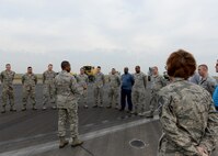 ALTUS AIR FORCE BASE, Okla. – U.S. Air Force Gen. Darren McDew, Air Mobility Command commander, addresses Airmen from the 97th Civil Engineer Squadron, April 8, 2015. McDew watched as crews removed rubber from the runway and answered questions from Airmen. (U.S. Air Force photo by Airman 1st Class Nathan Clark/Released)