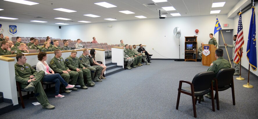 Maj. Bryant Bevan , 582nd Operations Support Squadron, Detachment 4, commander, speaks during an assumption of command ceremony at Malmstrom Air Force Base April 7, 2015. The 582nd OSS will report to the first ever Air Force helicopter group that was activated March of this year at 20ty Air Force. (U.S. Air Force photo/ Airman 1st Class Dillon Johnston)