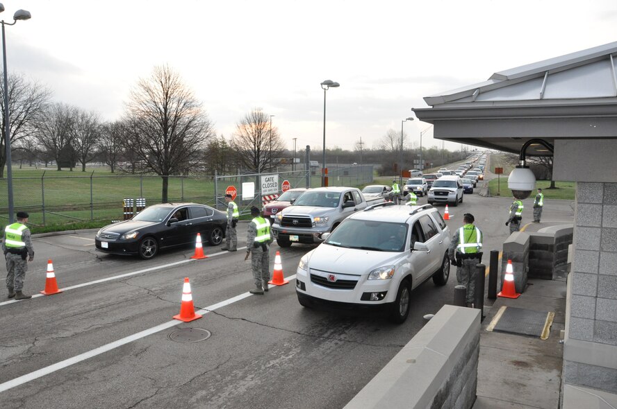 Security Forces check personnel coming through Gate 15A at Wright-Patterson AFB on April 8, 2015. Like the Security Forces protecting our base, there are many things we can do to protect ourselves, our families and our homes. US Air Force Photo by Jim Mitchell. 
