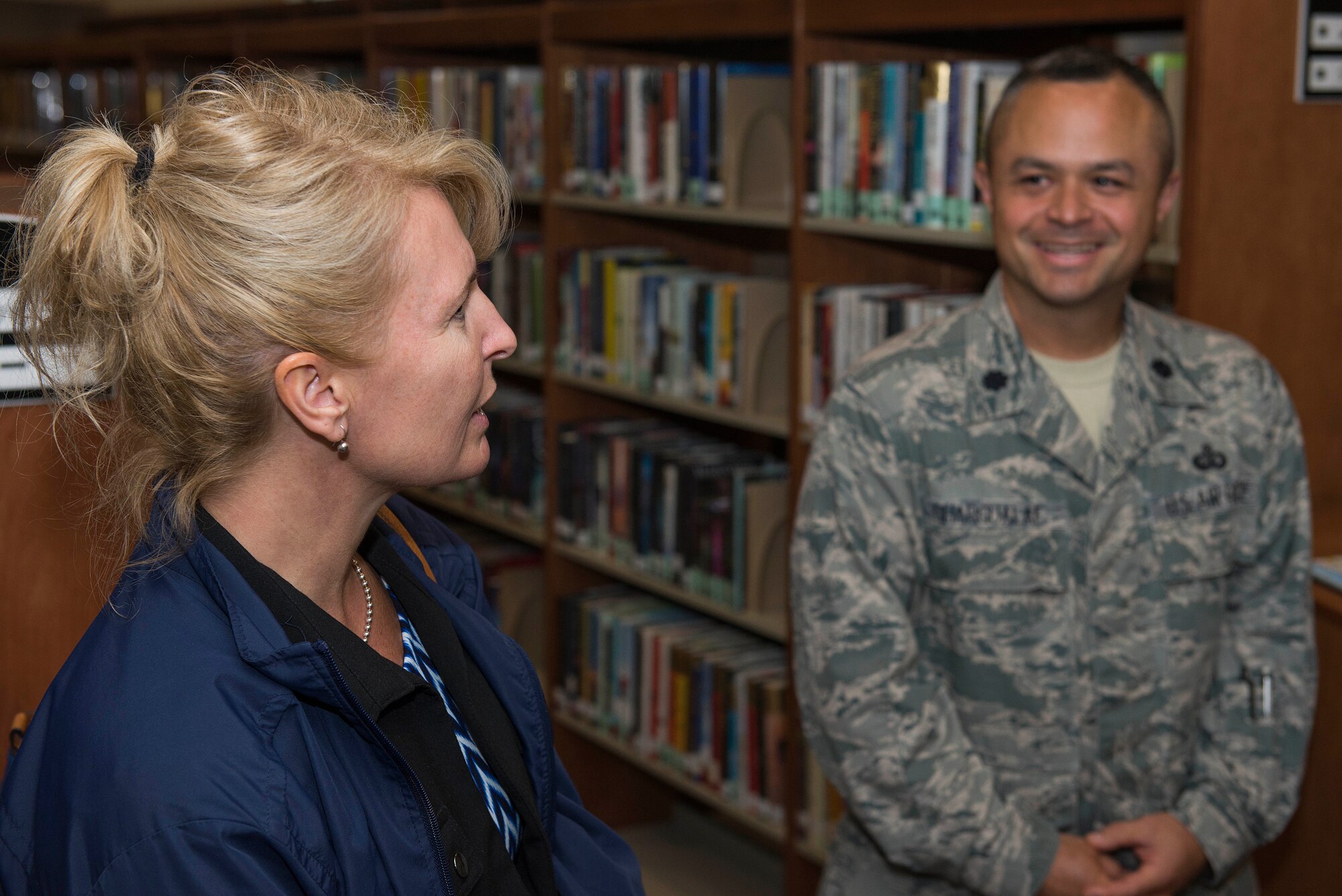 Athena Cody, wife of Chief Master Sgt. of the Air Force James A. Cody, spoke to U.S. Air Force Lt. Col. Joseph Chargualaf Jr., 82nd Force Support Squadron commander, and other members from the squadron at the Sheppard Air Force Base, Texas, library, April 8, 2015. Cody talked about the different methods of communicating and the tools available for commanders to empower their Airmen. (U.S. Air Force photo by Senior Airman Kyle Gese/Released)

