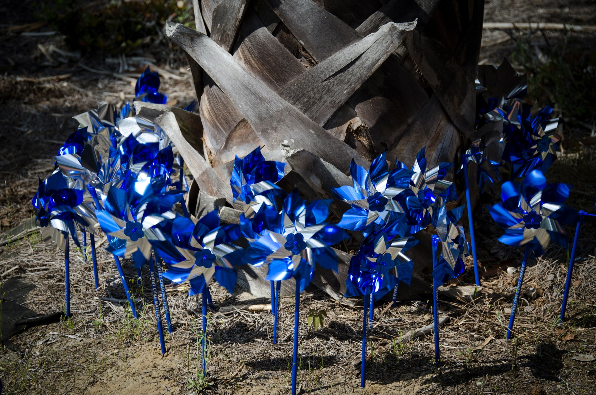 A pinwheel garden is displayed in front of the Karen Scott Heath Child Development Center on April 8, 2015 at Joint Base Charleston – Weapons Station, S.C. The pinwheels are a symbol for child abuse prevention and are intended to be an uplifting reminder of childhood and the bright future children deserve. (U.S. Air Force photo/Staff Sgt. AJ Hyatt)
