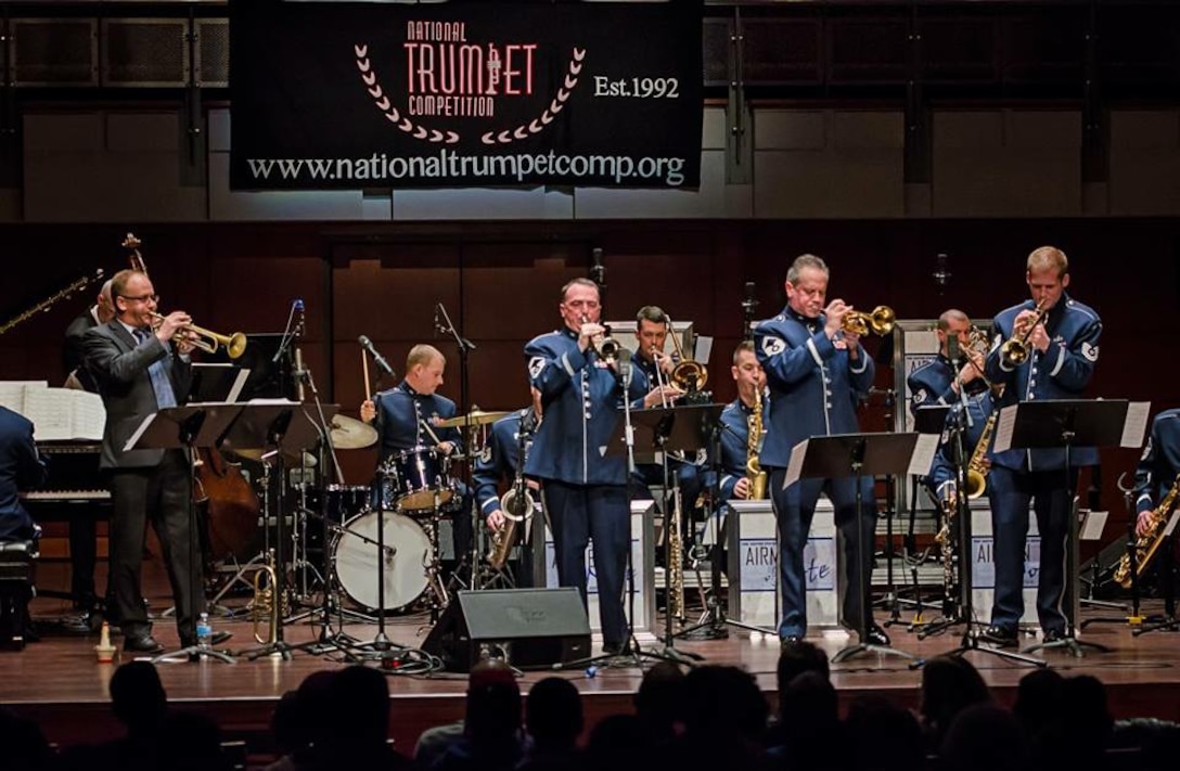 The Airmen of Note recently performed a concert as part of the National Trumpet Competition.  Guest artist Scott Wendholt performed with the band and was featured with the trumpet section, including Senior Master Sgt Brian Macdonald, Senior Master Sgt Kevin Burns, and Technical Sgt Luke Brandon. (U.S. Air Force Photo by Senior Master Sgt Bob Kamholz/released)
