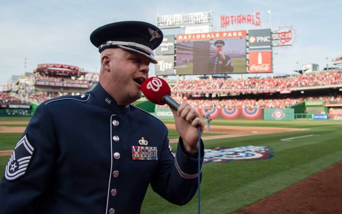 Senior Master Sgt Ryan Carson, singer with the United States Air Force Band Max Impact,
represented the excellence of all our nation's Airmen this week as he sang America the Beautiful at the Washington Nationals home opener. (U.S. Air Force Photo by Airman 1st Class Philip Bryant/released)
