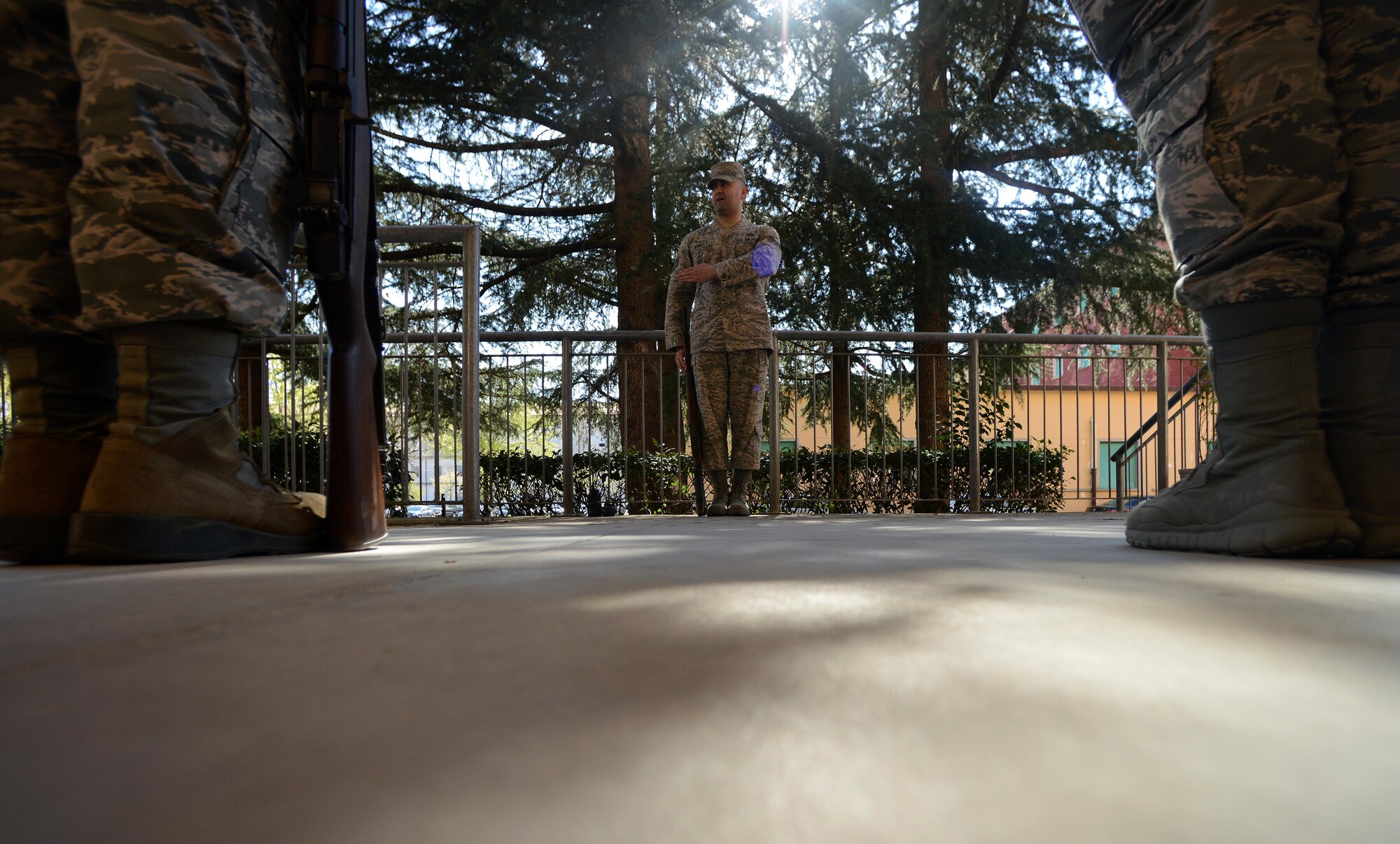U.S. Air Force Staff Sgt. Zana Hikmat, Aviano 31st Fighter Wing honor guard NCO in change, trains fellow honor guardsmen during practice, April 8, 2015, at Aviano Air Base, Italy. To obtain the title of honor guardsman, each member is tested on marching, rifle and flag movements and flawlessly reciting the honor guard charge. (U.S. Air Force photo by Airman 1st Class Deana Heitzman/Released)  