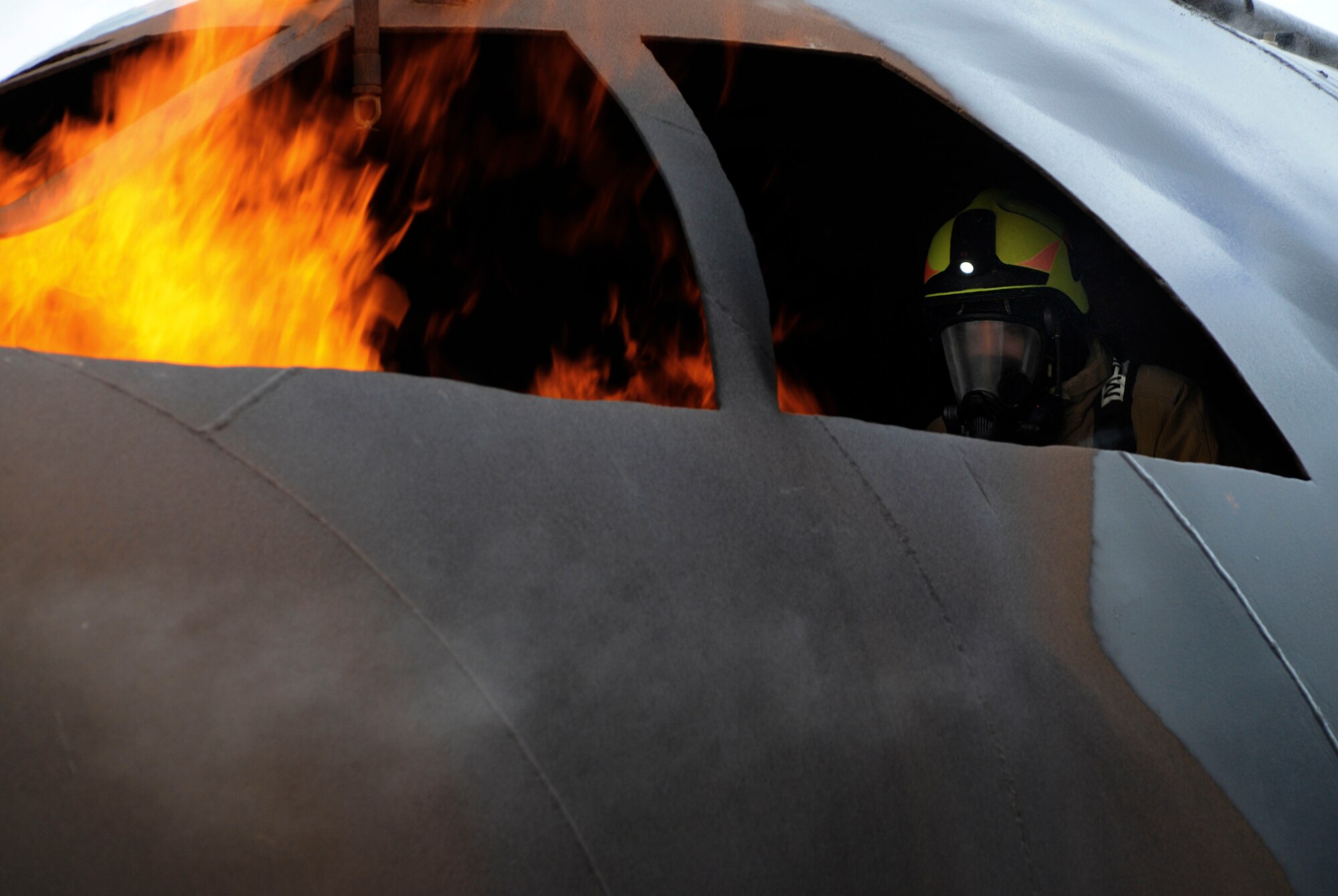 Col. Craig Wills, 39th Air Base Wing commander, extinguishes a fire during a firefighter training April 2, 2015, at Incirlik Air Base, Turkey. Wills embedded into a training with the 39th Civil Engineer Squadron Incirlik Fire Emergency Services to learn more about their equipment, rescue techniques and firefighting as part of the commander’s Out Connecting with Airmen program. (U.S. Air Force photo by Senior Airman Krystal Ardrey/Released)