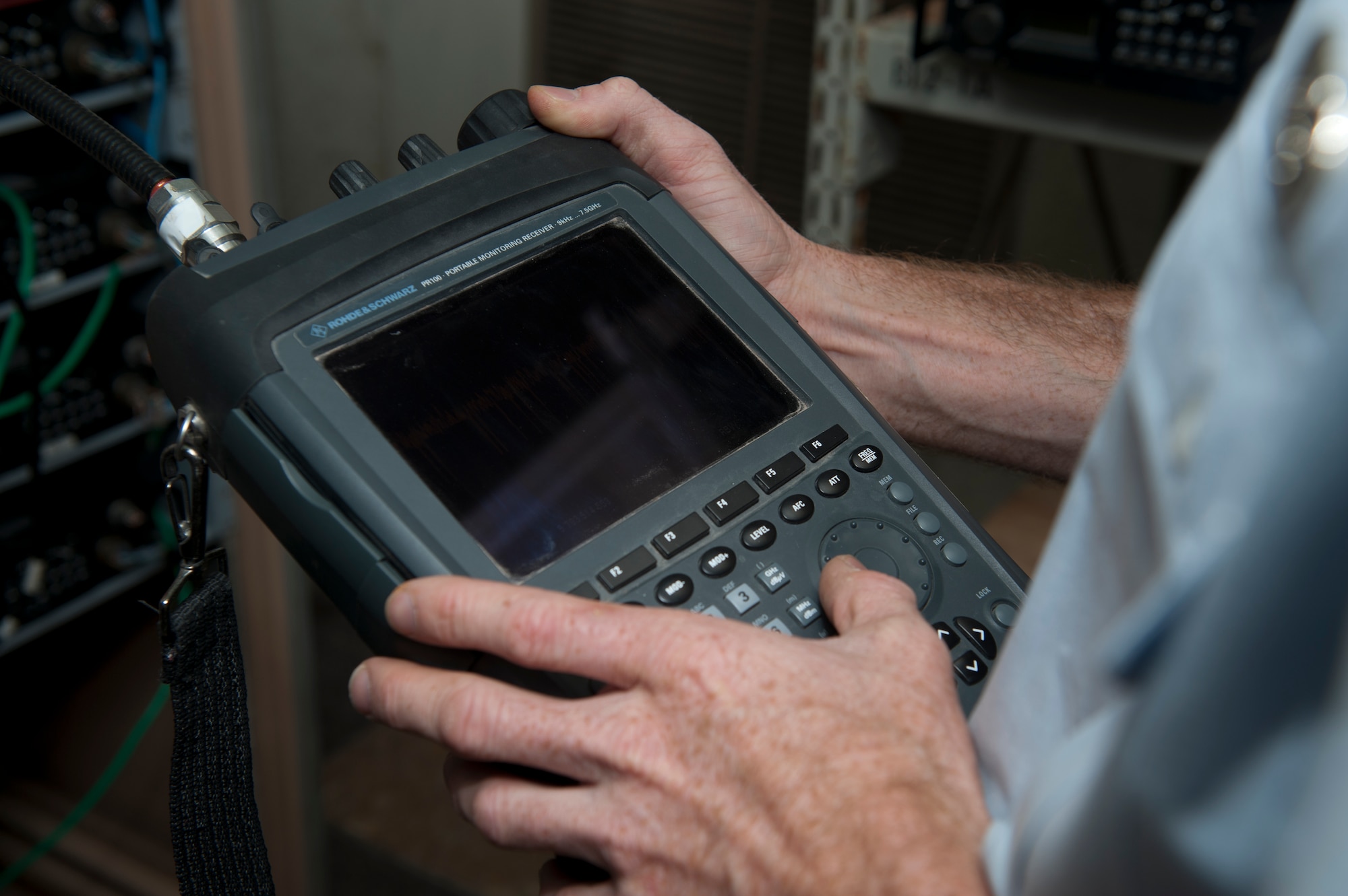 Senior Airman Anthony Payne, Ground Radio technician, runs checks on radio equipment to ensure communication capability for Aircraft is properly functioning at Holloman Air Force Base, N.M., April 8, 2015. Ground Radio communications serves the U.S. Air Force by installing, maintaining and repairing fixed and transportable transmitters, receivers, transceivers and related equipment. “Serving has changed my life a lot,” said Payne. “I found something that I love to do, in a career field that I did not choose but I have fallen in love with it. It’s definitely given me a lot more direction in life as to where I am going.” (U.S. Air Force photo by Senior Airman Chase Cannon/Released)