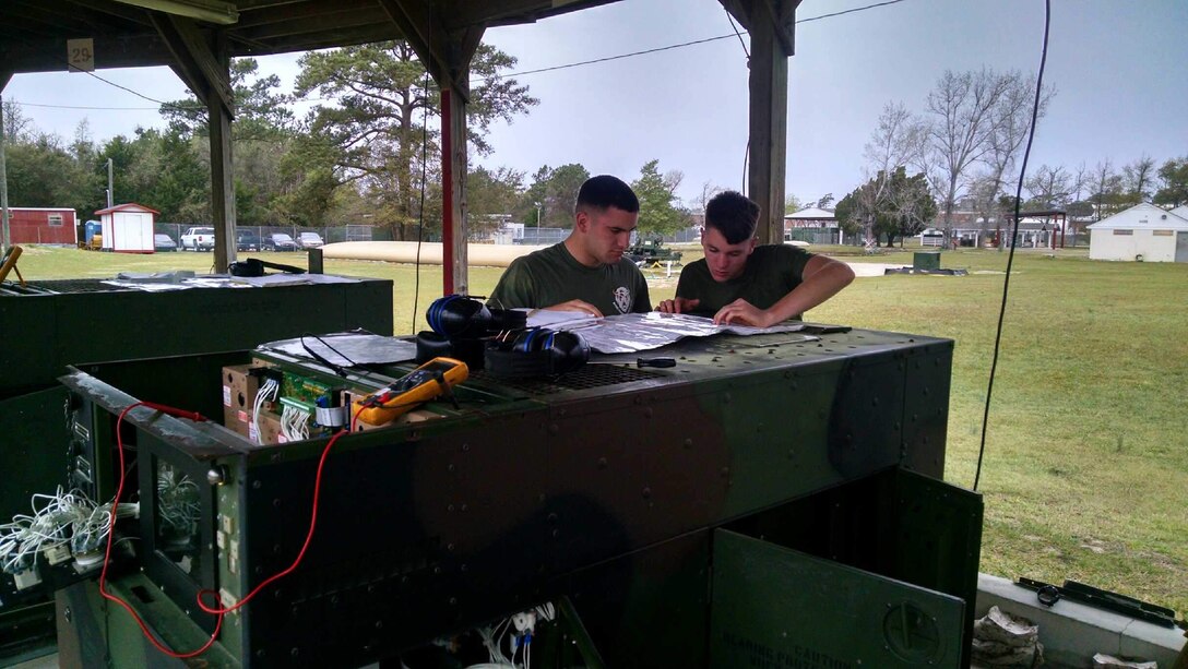 Marines conduct Bravo generator troubleshooting practical application.
