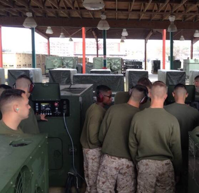 Marines learn about generator operations.