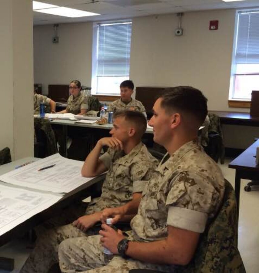 Marines learn to color code the load bank schematics.