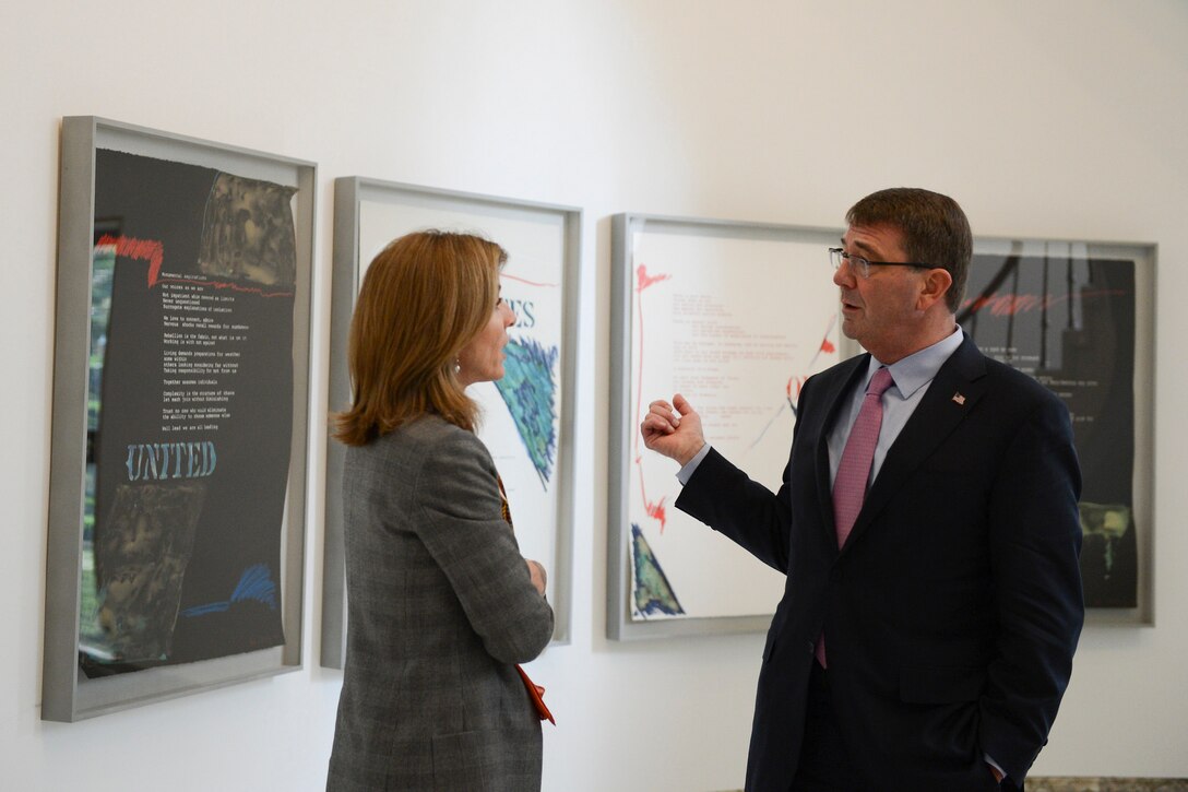U.S. Defense Secretary Ash Carter, right, speaks with U.S. Ambassador to Japan Caroline Kennedy after a breakfast at the U.S. Ambassador's residence in Tokyo, April 9, 2015. 