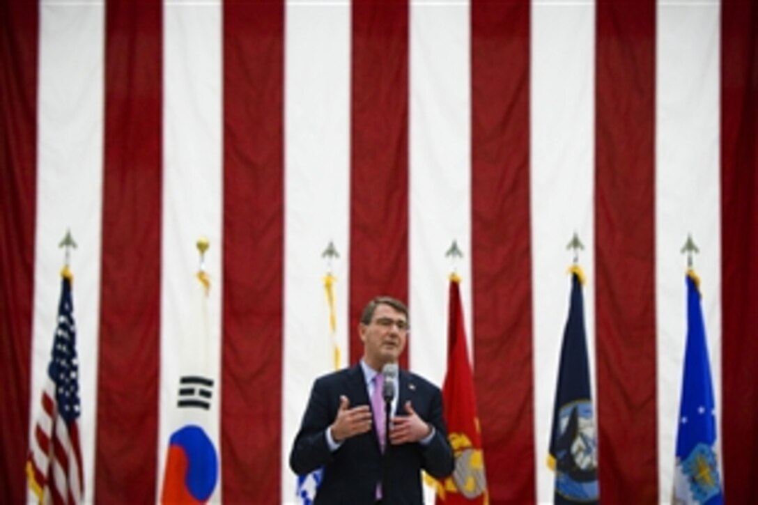 U.S. Defense Secretary Ash Carter speaks with service members during a troop event on Osan Air Base, South Korea, April 9, 2015. It is Carter's first trip as secretary to the Asia-Pacific region to strengthen ties and reaffirm commitment to the rebalance.