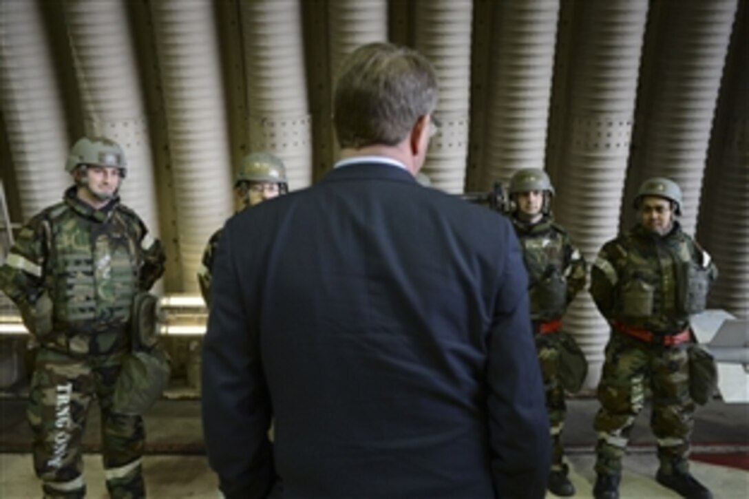 U.S. Defense Secretary Ash Carter is briefed on the missions and capabilities of the F-16 Fighting Falcon by members of the 51st Fighter Wing on Osan Air Base in South Korea, April 9, 2015. Carter is on a visit to the U.S. Pacific Command Area of Responsibility to make observations for the future force and the rebalance to the Pacific. 