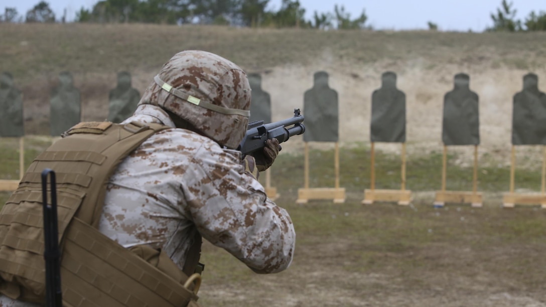 1st Lt. Brandon Hardin, an intelligence officer with 2nd Intelligence Battalion, fires an M1014 shotgun at a target during the battalion’s field exercise aboard Marine Corps Base Camp Lejeune, North Carolina, April 7, 2015. Marines with the unit gained a better understanding of the difference in recoil and firing techniques of the M1014 shotgun compared to the M16 and M4 rifles.