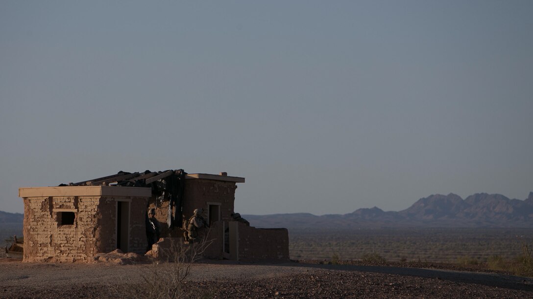 A U.S. Marine Corps infantryman with 1st Battalion, 5th Marine Regiment, 1st Marine Division participates in a heavy Huey raid exercise during Weapons and Tactics Instructor (WTI) Course 2-15 at Yuma Proving Grounds near Yuma, Ariz., April 8, 2015. WTI is a seven-week event hosted by Marine Aviation Weapons and Tactics Squadron One (MAWTS-1) cadre. MAWTS-1 provides standardized tactical training and certification of unit instructor qualifications to support Marine aviation Training and Readiness and assists in developing and employing aviation weapons and tactics. 