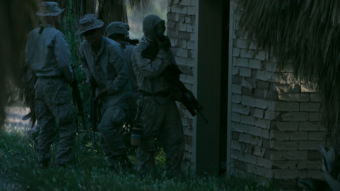 U.S. Marine Corps infantrymen with 1st Battalion, 5th Marine Regiment, 1st Marine Division participate in a heavy huey raid exercise during Weapons and Tactics Instructor (WTI) Course 2-15 at Yuma Proving Grounds near Yuma, Ariz., April 8, 2015. WTI is a seven-week event hosted by Marine Aviation Weapons and Tactics Squadron One (MAWTS-1) cadre. MAWTS-1 provides standardized tactical training and certification of unit instructor qualifications to support Marine aviation Training and Readiness and assists in developing and employing aviation weapons and tactics. 
