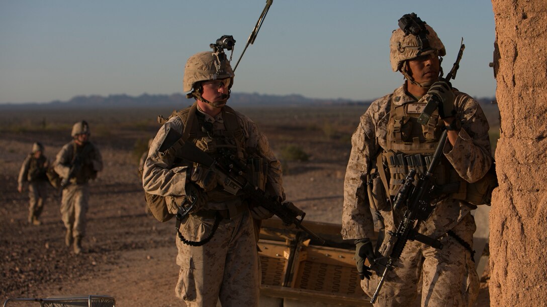 U.S. Marine Corps infantrymen with 1st Battalion, 5th Marine Regiment, 1st Marine Division participate in a heavy huey raid exercise during Weapons and Tactics Instructor (WTI) Course 2-15 at Yuma Proving Grounds near Yuma, Ariz., April 8, 2015. WTI is a seven-week event hosted by Marine Aviation Weapons and Tactics Squadron One (MAWTS-1) cadre. MAWTS-1 provides standardized tactical training and certification of unit instructor qualifications to support Marine aviation Training and Readiness and assists in developing and employing aviation weapons and tactics. 