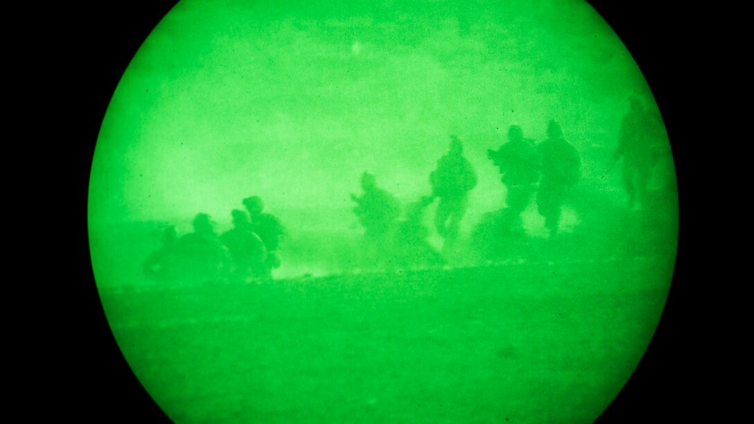 A U.S. Marine Corps infantrymen with 1st Battalion, 5th Marine Regiment, 1st Marine Division participate in a heavy huey raid exercise during Weapons and Tactics Instructor (WTI) Course 2-15 at Yuma Proving Grounds near Yuma, Ariz., April 8, 2015. WTI is a seven-week event hosted by Marine Aviation Weapons and Tactics Squadron One (MAWTS-1) cadre. MAWTS-1 provides standardized tactical training and certification of unit instructor qualifications to support Marine aviation Training and Readiness and assists in developing and employing aviation weapons and tactics.