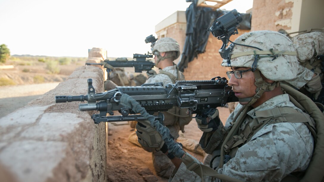 U.S. Marine Corps infantrymen with 1st Battalion, 5th Marine Regiment, 1st Marine Division participate in a heavy huey raid exercise during Weapons and Tactics Instructor (WTI) Course 2-15 at Yuma Proving Grounds near Yuma, Ariz., April 8, 2015. WTI is a seven-week event hosted by Marine Aviation Weapons and Tactics Squadron One (MAWTS-1) cadre. MAWTS-1 provides standardized tactical training and certification of unit instructor qualifications to support Marine aviation Training and Readiness and assists in developing and employing aviation weapons and tactics. 