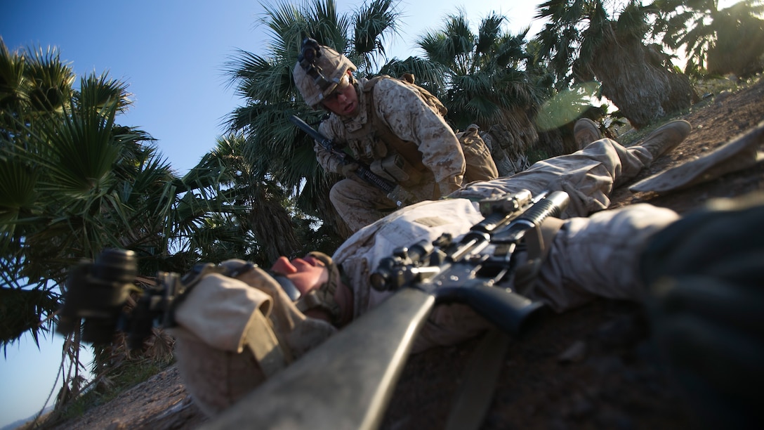 U.S. Marine Corps infantrymen with 1st Battalion, 5th Marine Regiment, 1st Marine Division participate in a heavy huey raid exercise during Weapons and Tactics Instructor (WTI) Course 2-15 at Yuma Proving Grounds near Yuma, Ariz., April 8, 2015. WTI is a seven-week event hosted by Marine Aviation Weapons and Tactics Squadron One (MAWTS-1) cadre. MAWTS-1 provides standardized tactical training and certification of unit instructor qualifications to support Marine aviation Training and Readiness and assists in developing and employing aviation weapons and tactics. 