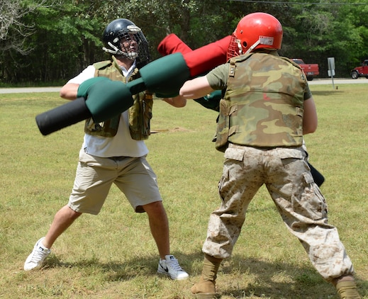 Eddie Zedaker with TTL Inc. tests his abilities against a Marine opponent during pugil stick training. He was part of the Leadership Albany Class of 2015, who participated in daylong activities aboard Marine Corps Logistics Base Albany, April 9. Representing various local businesses in Albany, the group learned about MCLB Albany and its tenant commands’ missions and roles in the Marine Corps. 