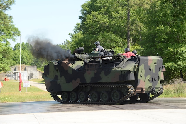 Members of Leadership Albany Class of 2015 ride in an assault amphibious vehicle on Marine Depot Maintenance Command/Production Plant Albany's test track. The group participated in daylong activities aboard Marine Corps Logistics Base Albany, April 9. Representing various local businesses in Albany, the group learned about MCLB Albany and its tenant commands’ missions and roles in the Marine Corps.