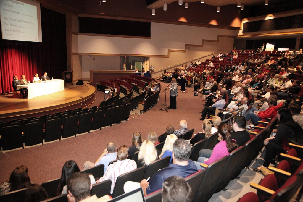 Attendees at the Prado Dam mural public meeting held April 9 at the Corona High School Performing Arts Center talk about the the Bicentennial mural, its significance to the local area and the nation at large, and their desire to it replicated.