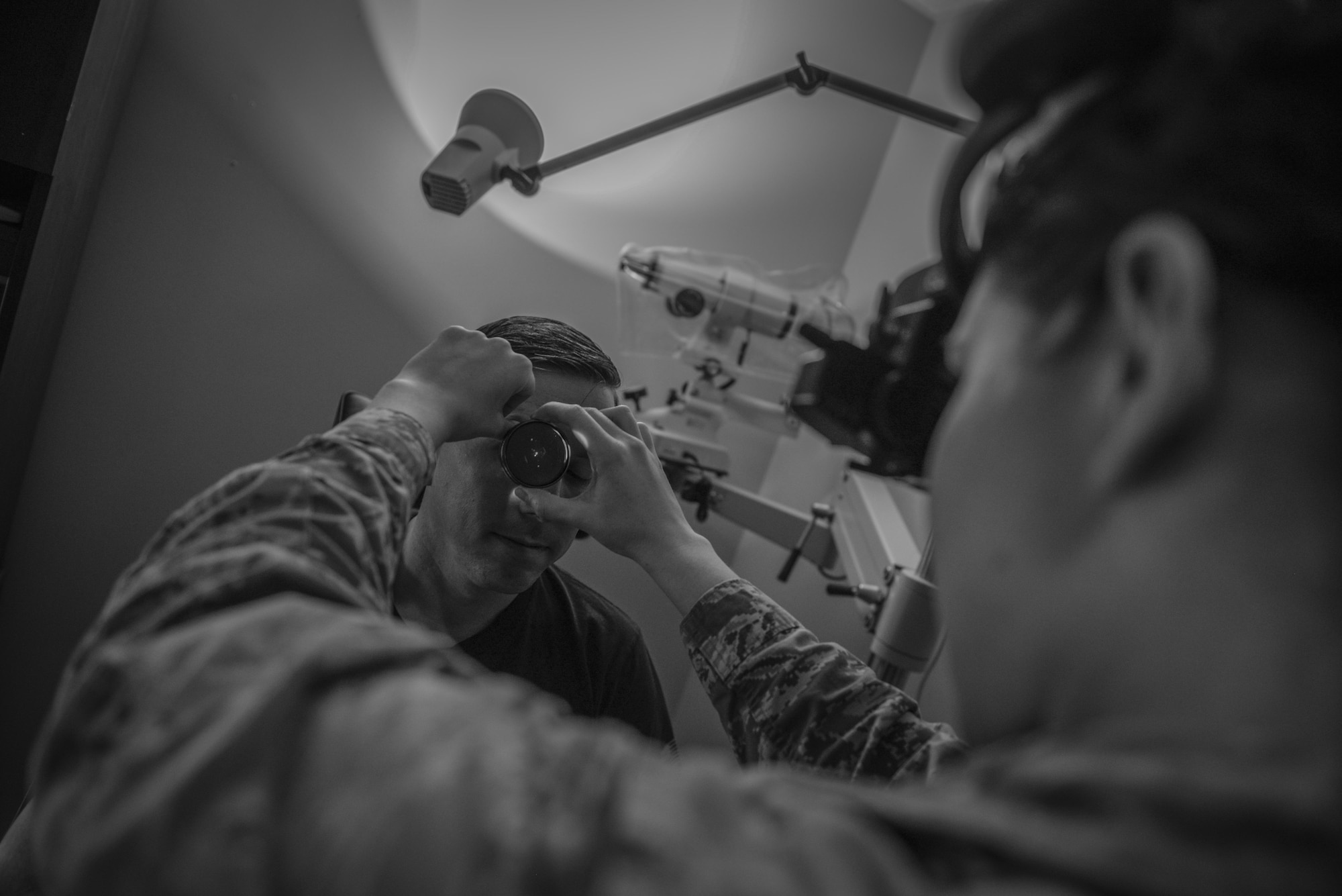 Capt. Nikki Lagendyk, 1st Special Operations Aerospace Medical Squadron optometrist, performs a routine eye exam at the 1st Special Operations Medical Group on Hurlburt Field, Fla., April 8, 2015. The 1st SOMDG’s mission is to provide exceptional deployment medicine, readiness support, fit and healthy warfighters and access for Air Commandos and their families. (U.S. Air Force photo/Senior Airman Christopher Callaway) 