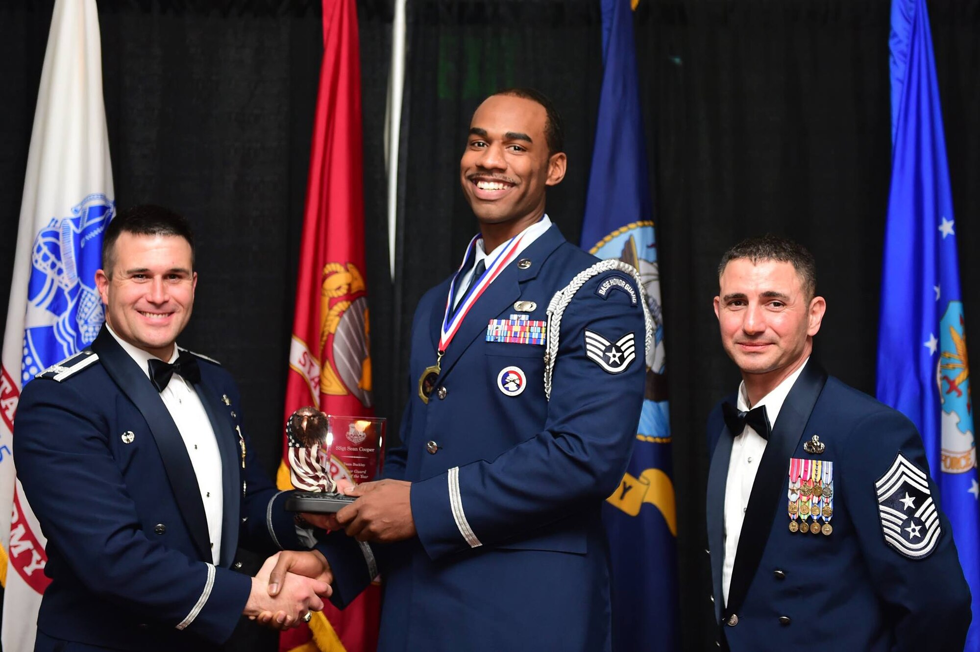 Staff Sgt. Sean Cooper, ARPC retirements service team technician, was recognized as Team Buckley Honor Guard of the Year for 2014 during a ceremony Feb. 27 at the Summit Event Center, Aurora, Colorado. (U.S. Air Force photo/Airman 1st Class Luke W. Nowakowski)