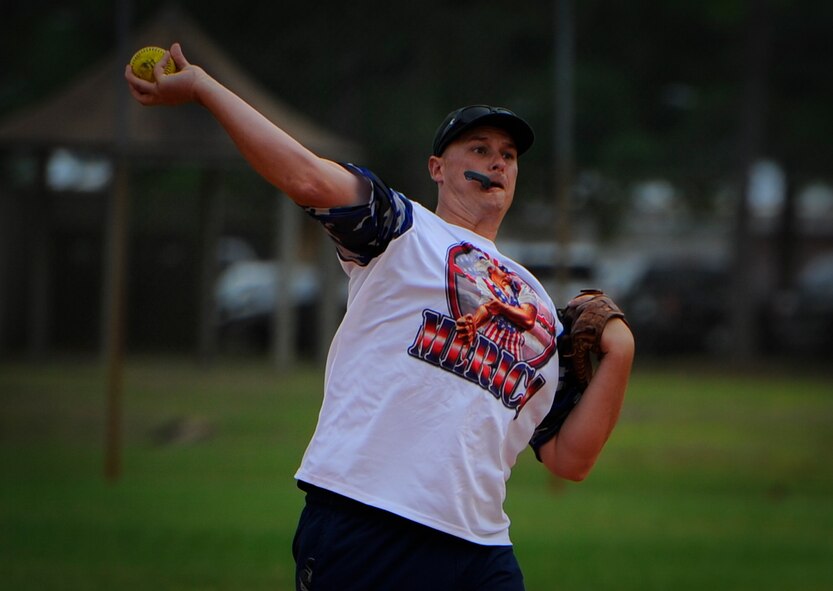 Mark Romero, 25th Intelligence Squadron third baseman, throws to first base during a game at Hurlburt Field, Fla., April 6, 2015. The game pitted the 25th IS against the 1st Special Operations Security Forces Squadron. (U.S. Air Force photo/Senior Airman Christopher Callaway)