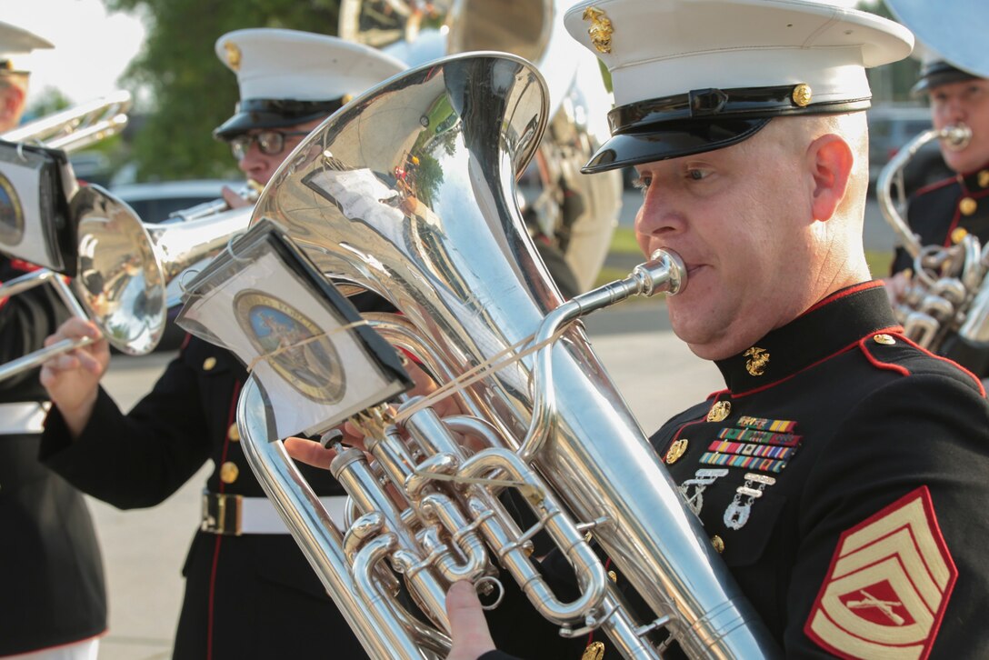 Gunnery Sgt. Michael J. Maschmeier, enlisted conductor of Marine Corps Band New Orleans, plays the euphonium during the New Orleans Zephyrs baseball game at Zephyr Field, April 9, 2015. Marine Corps Band New Orleans is the seventh Marine Corps Band Maschmeier has played with. By playing in different events, the band is able to enhance the connection and relationship between the Marine Corps and the New Orleans community.  (U.S Marine Corps photo by Lance Cpl. Ian Ferro)