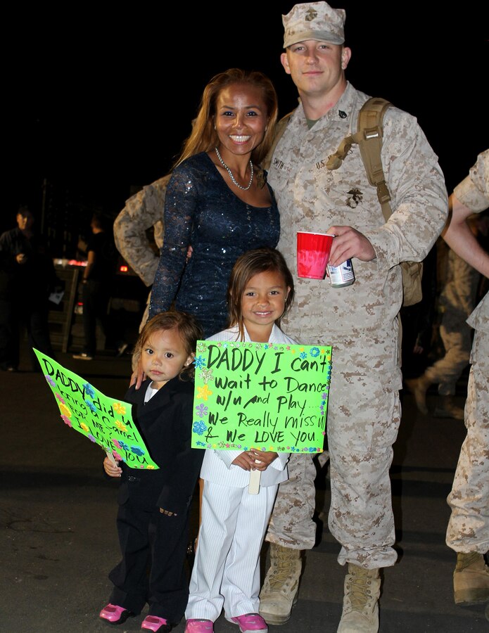 Families, friends and coworkers welcome home 100 Marines and Sailors from the command and logistics combat elements who deployed with the Special Purpose Marine Air Ground Task Force – Crisis Response – Central Command on Camp Pendleton, Calif., April 5, 2015.  The Marines and Sailors deployed in September 2014 and were reinforced in December 2014. The SPMAGTF-CR-CC is a crisis response force that has the flexibility to quickly adapt to rapidly changing environments.
