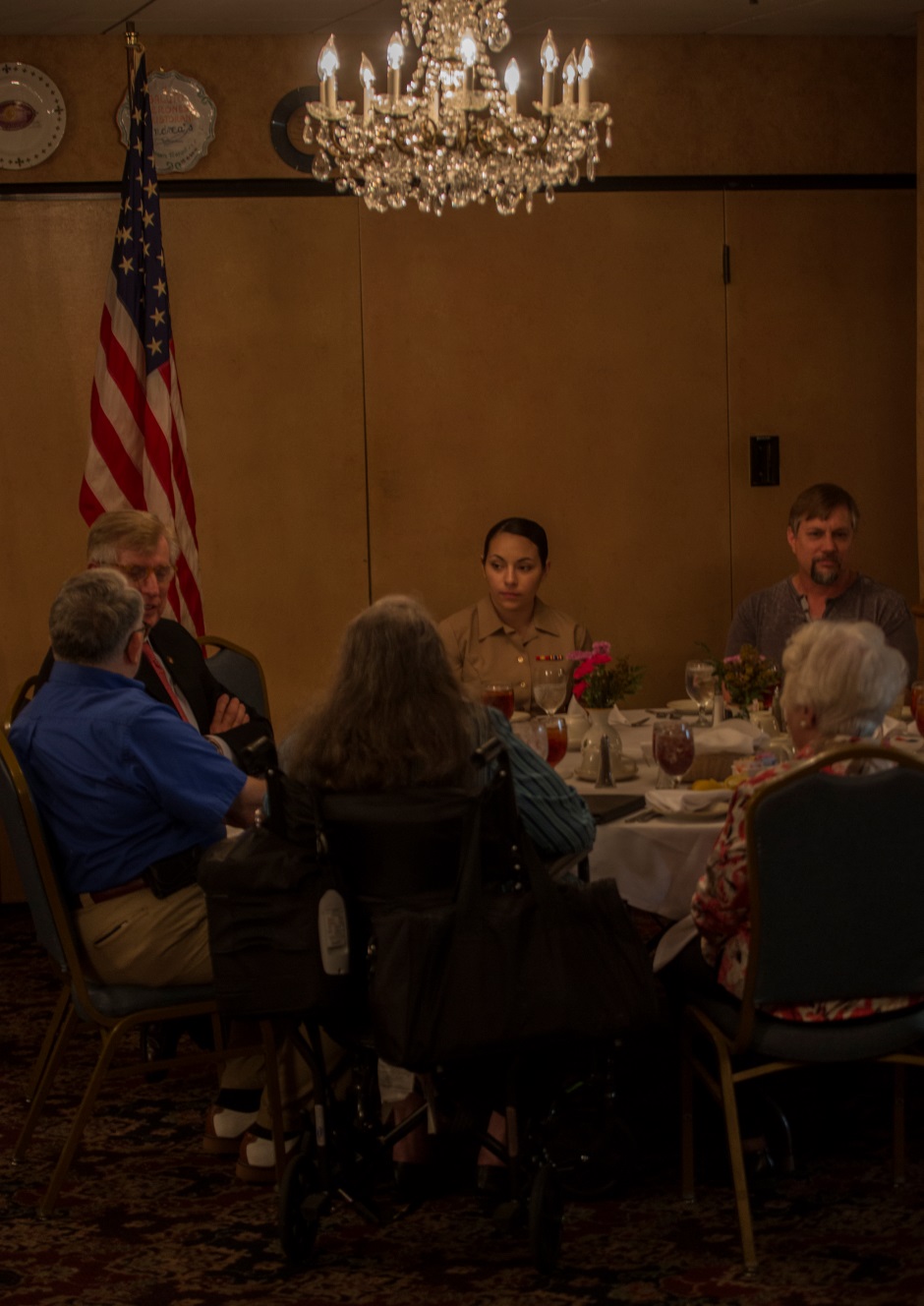 Lance Cpl. Samantha P. Bowling, administrative clerk with Marine Forces Reserve, sits with retired Marines from the Marine Support Group at Andrea’s Restaurant in New Orleans, April 10, 2016. Young Marines had the opportunity to spend time with Marines who served in WWI and WWII and hear about their experiences in the Corps. Through the ages, Marines young and old, regardless of gender, religion or race, all share a common bond through the eagle, globe and anchor that each wears proudly across their heart.  