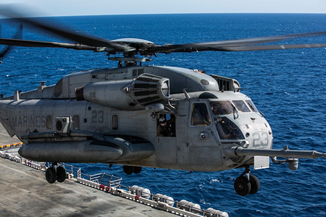 A CH-53E Super Stallion CH-53 Sea Stallion with Marine Medium Tiltrotor Squadron 161 (Reinforced), 15th Marine Expeditionary Unit, lands aboard the USS Essex (LHD 2) during Certification Exercise (CERTEX) off the coast of San Diego April 9, 2015. The CH-53Es provide heavy lift to the MEU and can support the wide variety of missions the MEU may be tasked with while deployed. (U.S. Marine Corps photo by Cpl. Anna Albrecht/Released)