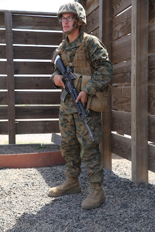 Private First Class William R. Potter, Platoon 2166, Hotel Company, 2nd Recruit Training Battalion, receives instruction prior to taking on the different challenges of the 12 Stalls event at Edson Range, Marine Corps Base Camp Pendleton, Calif., March 31. This event is designed to build small unit leadership within a fire team. The fire teams were given only a small set of tools and instructions and were on their way to complete each mission. The instructions described their task to be completed as well as guidelines they must follow to successfully complete the challenge. Today, all male recruits recruited from recruiting stations west of the Mississippi are trained at MCRD San Diego. The depot is responsible for training over 16,000 recruits annually. Company H is scheduled to graduate from recruit training, April 10.