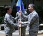 (Right to left) U.S. Air Force Col. Mickey Addison assumes command of the Air Force Installation and Mission Support Center Detachment 2 from Maj. Gen. Theresa Carter, AFIMSC commander, during an activation ceremony, April 9, 2015, Joint Base Pearl Harbor-Hickam, Hawaii. The Pacific detachment combines and overseas functions from the comptroller, civil engineer, communications, security forces, personnel and special services career fields. (U.S. Air Force photo by Staff Sgt. Amanda Dick/Released)