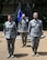 (Left to right) U.S. Air Force Maj. Gen. Theresa Carter, Air Force Installation and Mission Support Center commander; Col. Mickey Addison, AFIMSC Detachment 2 commander; and Chief Master Sgt. Jose LugoSantiago, AFIMSC command chief, await the official activation of the Pacific detachment, April 9, 2015, Joint Base Pearl Harbor-Hickam, Hawaii. The PACDET is the first detachment of the AFIMSC to activate in the Air Force. (U.S. Air Force photo by Staff Sgt. Amanda Dick/Released)