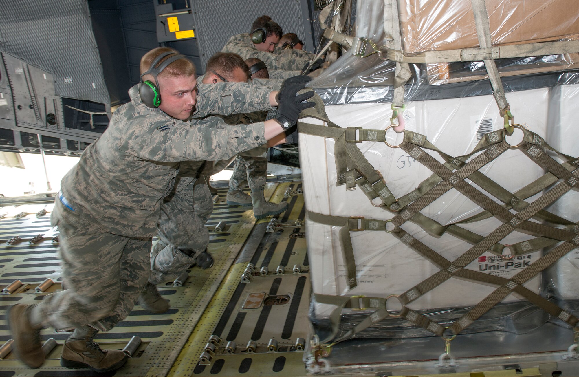 Airmen from Travis Air Force Base, Calif., were on a mission April 3 to set several world records in the C-5M Super Galaxy. A combined crew of Airmen from the 349th and 60th Air Mobility Wing prepared the aircraft for a mission that unofficially notched 45 records. (U.S. Air Force photo by Heide Couch)