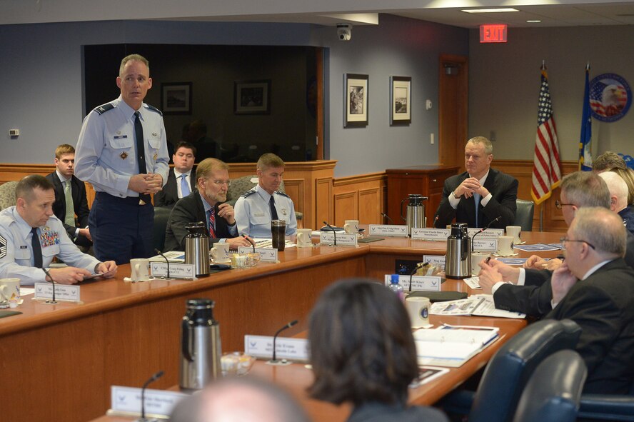 Col. Michael A. Vogel, 66th Air Base Group commander, briefs Mass. Governor Charlie Baker April 10. The governor received technology demonstrations and visited the Hanscom Collaboration and Innovation Center. (U.S. Air Force Photo by Jerry Saslav)