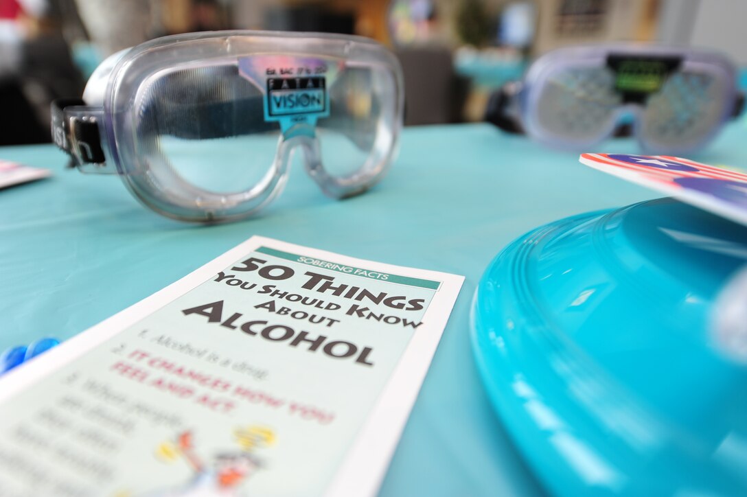 The 633rd Medical Operations Squadron Alcohol and Drug Abuse Prevention and Treatment team provided a booth alongside partnering agencies during the Sexual Assault Awareness Fair at the U.S. Air Force Hospital Langley atrium at Langley Air Force Base, Va. April 8, 2015. The fair featured agencies that could potentially serve clients affected by sexual assault including family advocacy, chaplains, ADAPT and the Sexual Assault Prevention and Response team. (U.S. Air Force photo by Staff Sgt. Natasha Stannard/Released) 