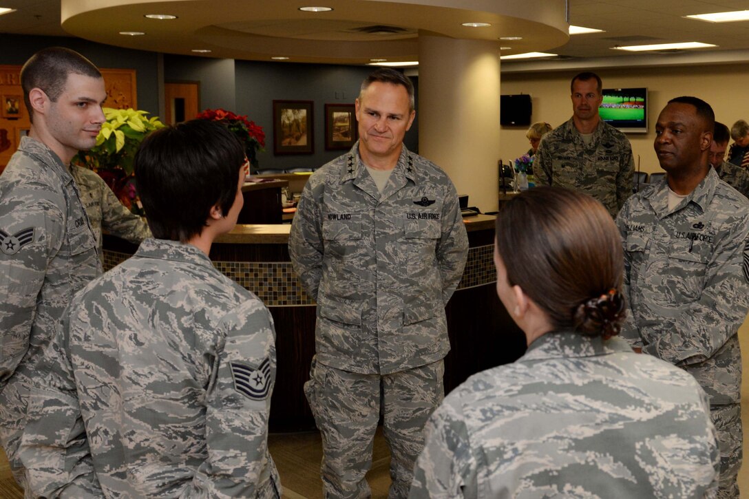 Lt. Gen. Chris Nowland, 12th Air Force commander, speaks with Airmen from the 28th Medical Operation Squadron Family Health Clinic during his visit at Ellsworth Air Force Base, S.D., April 8. 2015. Nowland toured the facility and congratulated Airmen on their contributions toward winning the 2014 Air Force Medical Service Outstanding Patient Center Medical Home award. (U.S. Air Force photo by Airman 1st Class Rebecca Imwalle/Released)