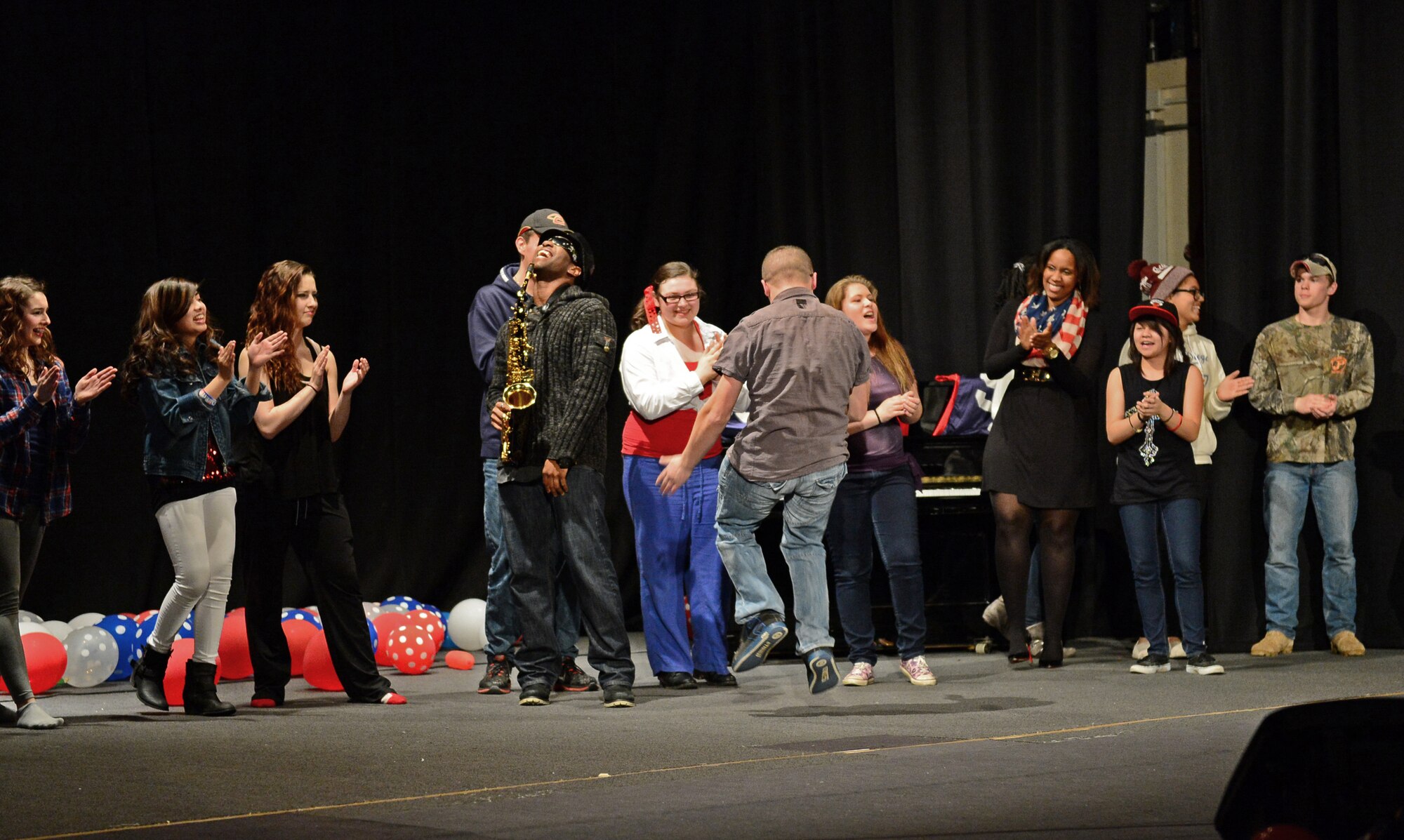 Jacob Wallace and Maria Griffis, Lakenheath High School students, perform “Crazy in Love” during a talent show at Royal Air Force Lakenheath, England, April 2, 2015. The show gave students the opportunity to showcase their talents outside of the academic environment. (U.S. Air Force photo by Airman 1st Class Erin R. Babis/Released)