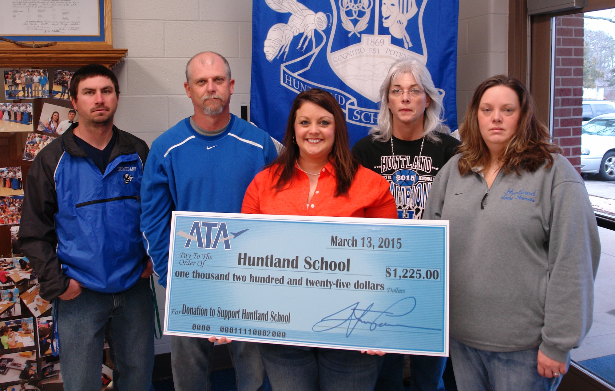The Aerospace Testing Alliance (ATA) Employee and Community Activities Committee (E&CAC) recently made a donation of $1,225 to student learning programs at Huntland School. As part of the Science, Technology, Engineering and Mathematics (STEM) Program for the school’s hands-on model building activities, funds will be used to purchase materials for designing and building model bridges. A portion will also go to the school’s math departments and the kindergarten’s “Brag Tag” program for rewarding positive behavior. Pictured left to right accepting the donation from E&CAC member Andrea Stephens (center) are Huntland School math teachers Brent Davis, Michael Tipps, Sheila Williams and Kim Collins. Teachers not pictured who will also benefit from the donation are Cindy Stovall and Tabitha Puryear. (Photo by Matt Walker)