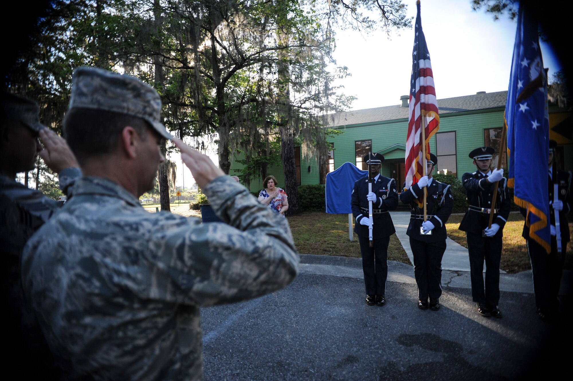 U.S. Air Force Col Chad Franks, 23d Wing commander, salutes the flag during the Blue Star Memorial Marker Dedication ceremony April 7, 2015 at Moody AFB, Ga.  The Garden Club of Georgia presented Moody with the Blue Star Memorial Marker as a symbol of support. (U.S. Air Force photo by Andrea Jenkins/Released)