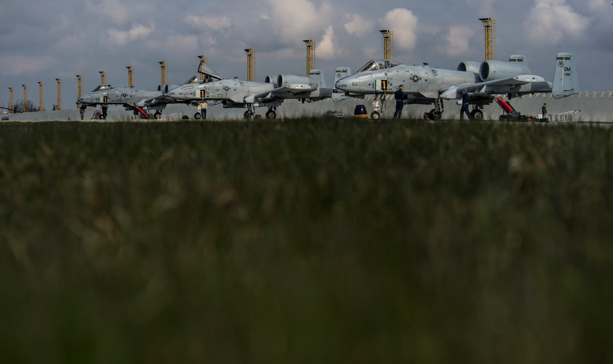 Airmen assigned to the 354th Expeditionary Fighter Squadron prep 4 U.S. Air Force A-10 Thunderbolt II attack aircraft for flight during a theater security package deployment to Namest Air Base, Czech Republic, April 9, 2015. More than 50 Airmen and support equipment from the 355th Fighter Wing at Davis-Monthan Air Force Base, Ariz., and the 52nd Fighter Wing at Spangdahlem Air Base, Germany, will support this deployment. (U.S. Air Force photo by Staff Sgt. Christopher Ruano/Released)