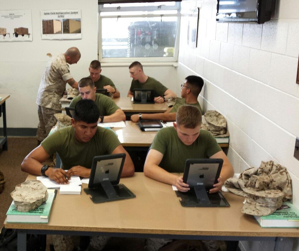 Marines from BRACT 3-15 learn about basic refrigeration cycle.