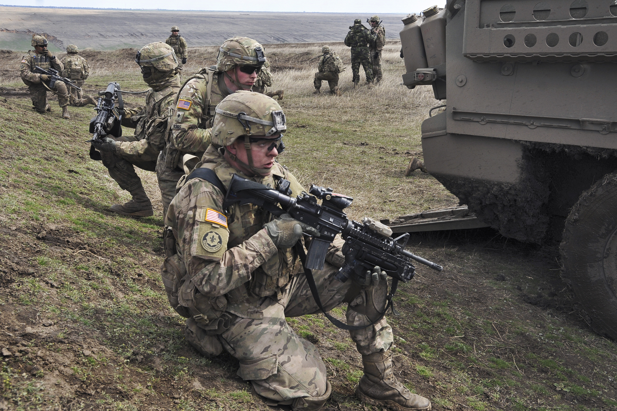 U.S. Army Spc. Joseph Goodballet, foreground, and other soldiers